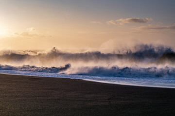 black beach heavy big waves in the ocean Iceland