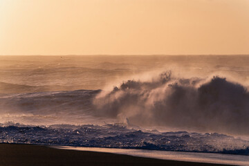 black beach in Iceland rough morning sunrise pretty orange golden hour sky