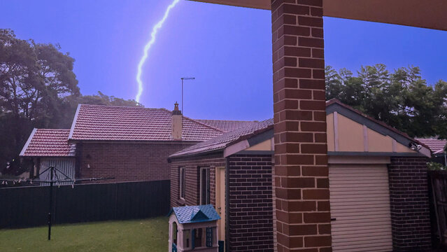 Thunderstorm on a Dark night in inner Sydney Suburb with strong rain lightning thunder strong winds Sydney Inner Western Suburbs NSW Australia