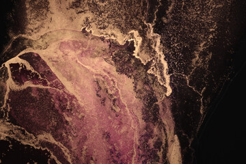 Glow smoke gold bronze glitter grain texture painting dot blot. Abstract lighting stain on black...