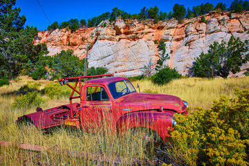 Vintage Red Tow Truck in Zion's Desert Landscape Eye-Level View