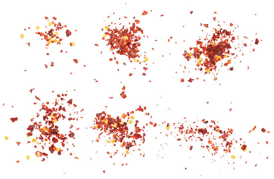 Set spicy chili red pepper flakes, chopped, milled dry paprika pile scattered isolated on white, top view