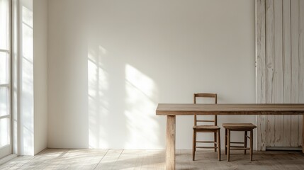 Fototapeta premium Minimalist room with wooden table and chairs, sunlight streaming through window.