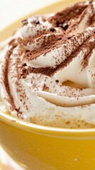 Fototapeta premium Tiramisu mousse with coffee-soaked layers, mascarpone mousse, and whipped cream, presented in a yellow bowl, rich and indulgent