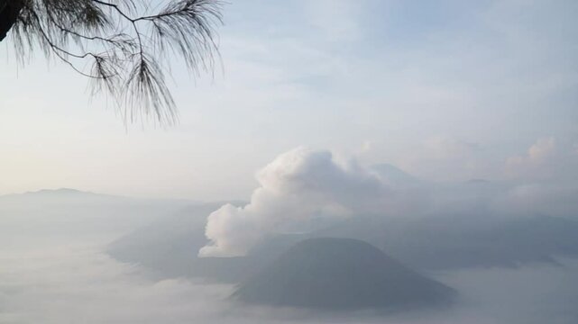 View of Mount Bromo at sunrise, Beautiful Penanjakan Mountains in Bromo National Park, Indonesia. Natural landscape background