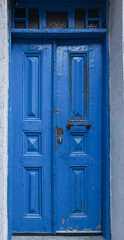 You will find the visual you are looking for in these photographs consisting of colored wood, metal and ornate doors.