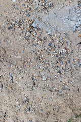Natural sand and gravel texture with small pebbles and rocks