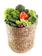 Different fresh vegetables in basket isolated on white