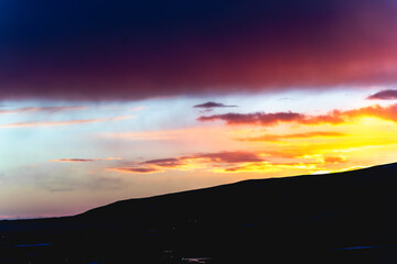 sunset in the mountains with snow iceland