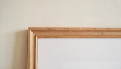 Close-up of intricate wooden frame corners against plain wall, texture art