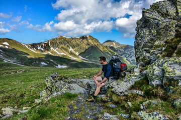 Young man trekking beautiful mountain