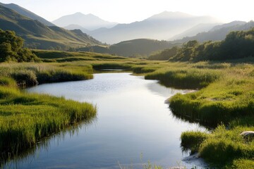 Serene river flowing through lush green valleys under soft morning light in a mountainous landscape
