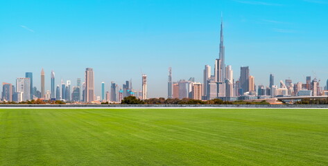  city building  skyline dubai landscape grass blue sky cityscape street travel
