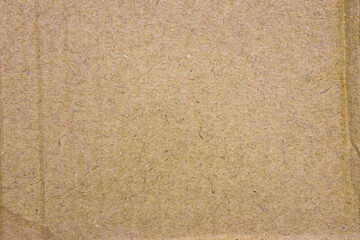 light brown corrugated cardboard texture useful as a background