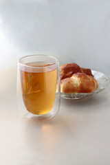 hot tea and tasty cakes close up