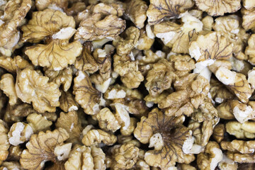Peeled walnuts food background close-up