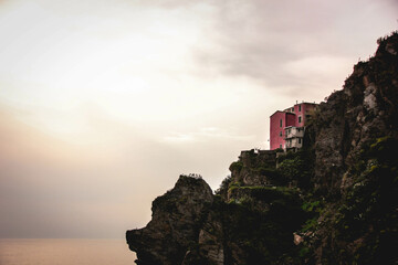 Red house on a cliff