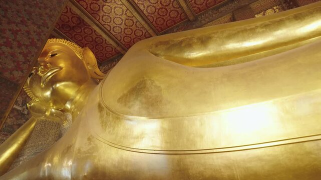Bangkok, Thailand - The largest golden Reclining Buddha statue at Wat Pho, one of Bangkok's oldest temples.