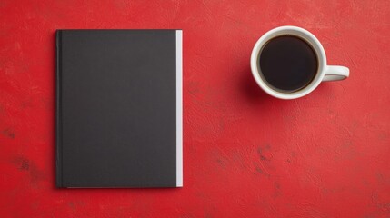 Divorce and law process, A minimalist desk setup featuring a black notebook and a coffee cup on a vibrant red background.