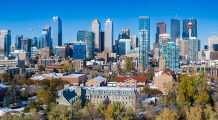 Calgary skyline, a mix of modern and older buildings, with a clear blue sky. Urban landscape, showcasing city development. Downtown, Calgary, Alberta, Canada