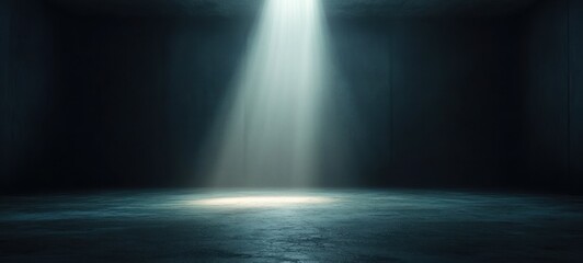 Dark Minimalist Studio Space with Spotlight on Cement Wall and Black Floor for Product Display