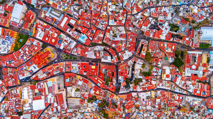 Zenithal view of the intricate and twisted streets of the city of Guanajuato. Its streets, tunnels and alleys create a fascinating labyrinth. © Jorch