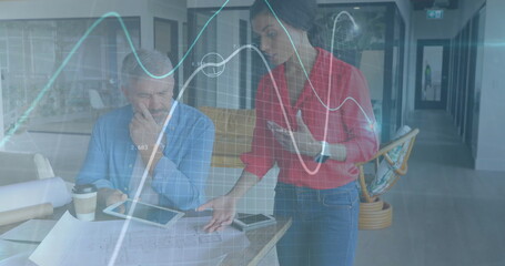 Image of financial data processing over diverse business people in office