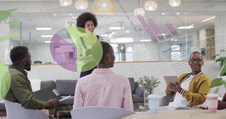 Image of data processing and diagrams over diverse colleagues discussing work