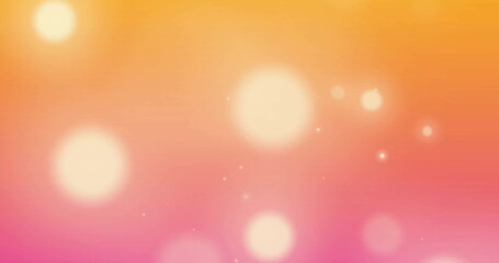 Image of glowing light spots over orange background