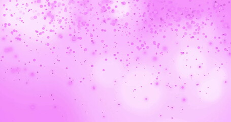 Image of glowing light spots moving over pink background