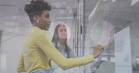 Image of financial data processing over diverse colleagues brainstorming in office