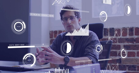 Image of financial data processing over caucasian businessman in office