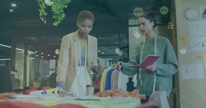 Image of network of connections over diverse colleagues discussing work in office