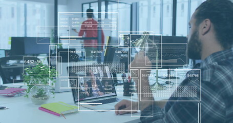 Image of financial data processing over biracial businessman in office