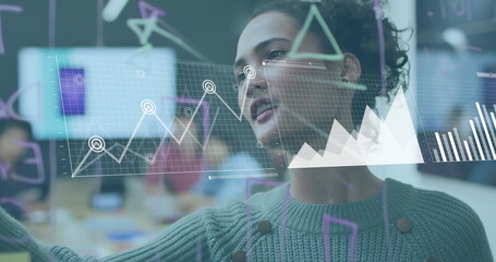 Image of financial data processing over biracial businesswoman in office