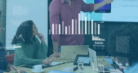 Image of charts processing data over colleagues at casual office meeting