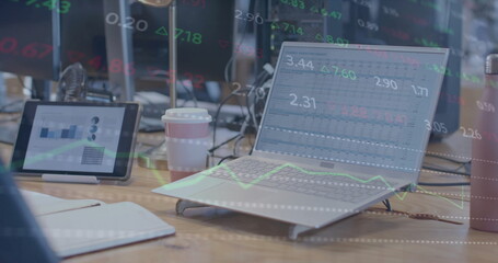 Image of financial data processing over computer on desk in office