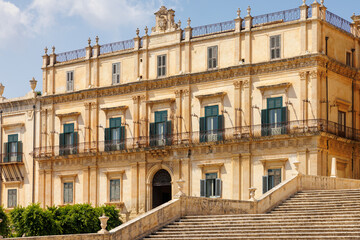 A stunning Baroque building near the central cathedral in Noto, Sicily, showcases the city's...