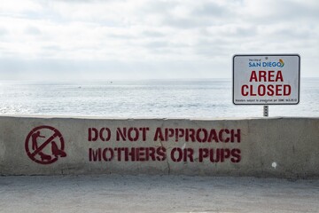 La Jolla, California. Sea lion closed beach signs