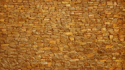 Brown orange gold background. Stone wall surface texture. For design.