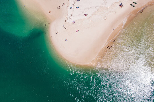 Aerial view of sandy beach with people, Gold Coast, Australia