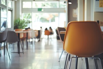 Contemporary Open Floor Co-Working Space with Stylish Chairs and Natural Light