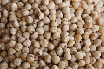 A Detailed CloseUp of Raw Hazelnuts Beautifully Arranged on Display