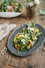 Salad with avocado, rocket and orange 