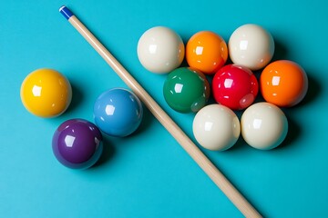 Vibrant Pool Balls & Cue on Teal Background: Flat Lay