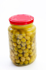Canned green peas on white background.