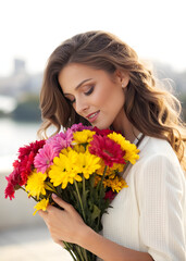 Naklejka premium A woman is holding a bouquet of flowers and smiling
