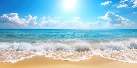 A calm seaside nature landscape with golden sand, crashing waves, and clear skies on a bright sunny day.