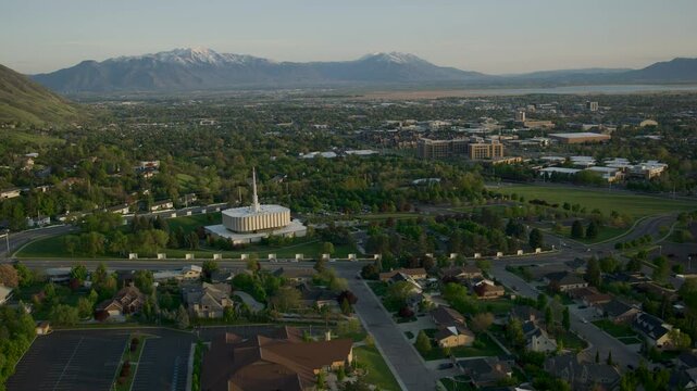 Soaring over old provo LDS temple at sunset, high shot
