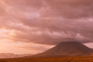 Naklejka premium Driving east on Route 27 in the Atacama Desert you see amazing sights like the stunning views of the Licancabur Volcano on the border between Chile and Bolivia. 